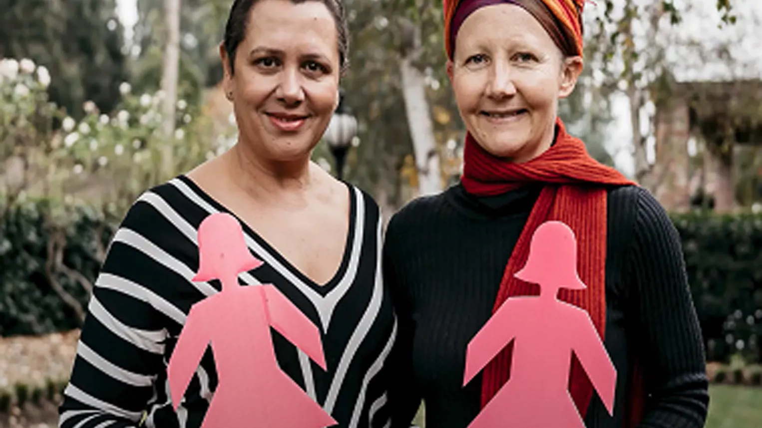 Two women with breast cancer holding BCNA pink lady