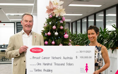 Image of corporate donor with large cheque