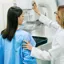 A woman is having a mammography examination at the hospital or private clinic with a professional female doctor